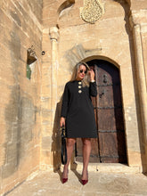 A01565 dress with metal buttons on the front